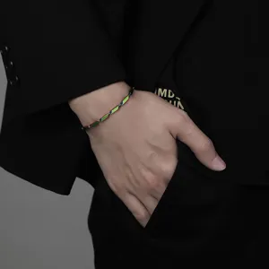 Detail shot of men titanium steel rainbow bamboo link bracelet, stylish fashion wrist jewelry.