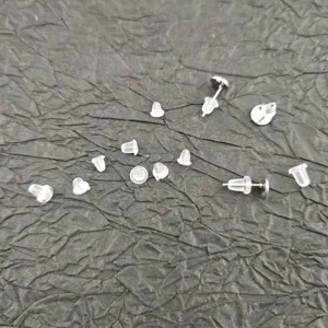 Clear silicone earring backs bulk, bullet and disc ear plugs for stud earrings safety.