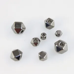 Detailed close-up of stainless steel hexagonal spacer beads, perfect for DIY jewelry crafting.