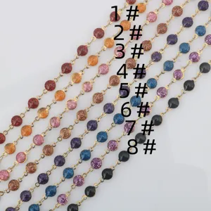 Stainless steel drop oil chain detail, colorful rhinestone link for jewelry making.