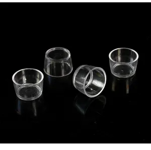 Detail shot of transparent mini plastic cups, perfect for DIY miniatures and dollhouse food.