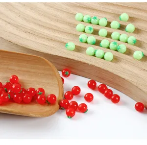 Miniature resin tomato toys, dollhouse food props and DIY kitchen accessories detail.