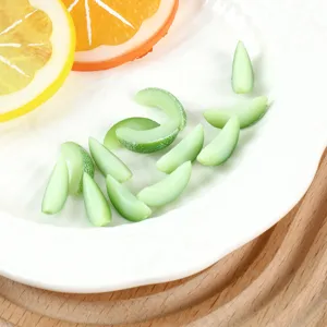 Miniature simulation honeydew melon slices fake fruit pieces for DIY crafts dollhouse play food.