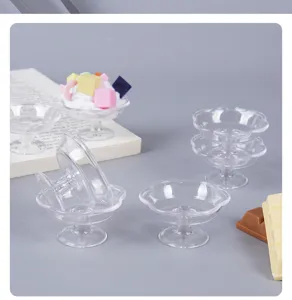 Mini transparent plastic dessert cups and miniature trays for DIY dollhouse food play scenes.