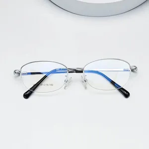 Women metal semi rimless oval prescription glasses frame detail view showing clear demo lens