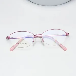 Close-up detail showing the pink semi-rimless oval metal eyeglass frame structure.
