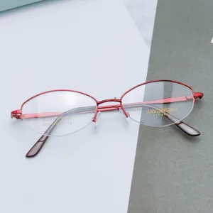 Details of red half-rim optical glasses frame, metal oval design with size 52-18-138 for women.