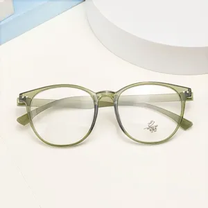 Close up of retro oval TR90 optical glasses frame with anti blue light lens sticker detail.