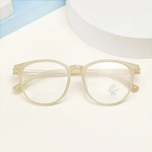 Lightweight retro blue light blocking optical glasses frame with stylish oval transparent design.