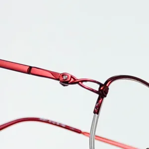 Red metal half-frame eyeglass frame, stylish oval designer optical glasses for women.