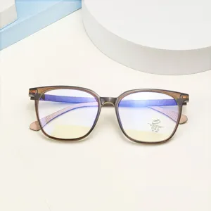 Detailed view of square retro TR90 anti-blue light glasses frame in brown translucent finish.