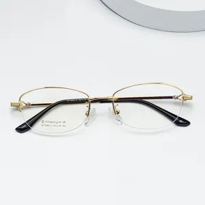 Detailed view of semi-rimless titanium eyeglasses frame, elegant oval design for women.