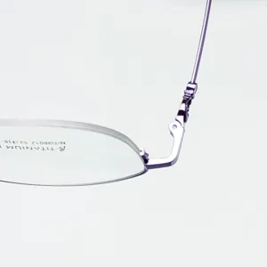 Elegant purple half-frame titanium eyeglasses frame for women with flexible oval design.