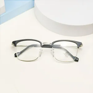 Detail view of anti-blue light optical glasses frame, stylish half-frame metal design.