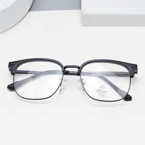 Closeup of stylish black half-frame anti-blue light glasses with UV400 lens protection.