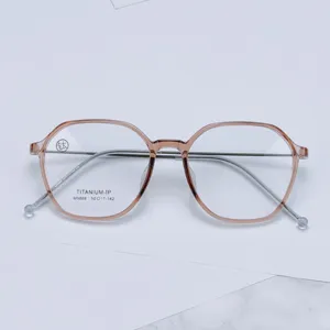 Montura de gafas poligonal minimalista de titanio puro con TR90, óptica ligera.