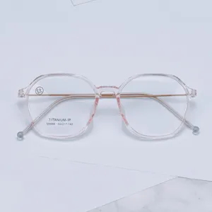 Montura de gafas de titanio poligonal rosa transparente, gafas ópticas M9888.