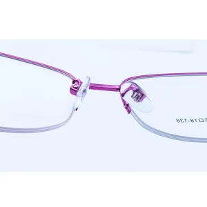 Detailed shot of women half-rim metal alloy optical glasses frame in stylish purple.