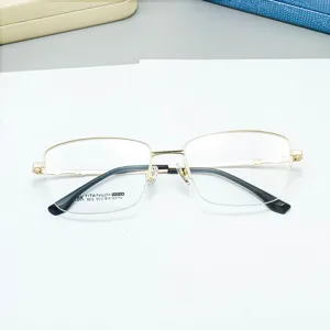 Vista dettaglio montatura occhiali uomo quadrata mezza montatura titanio, ottica business oro.