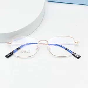 Detailed view of lightweight beta titanium optical eyeglass frame with square metal design.