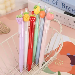 Cute fruit gel pens set with adorable silicone pendants, smooth writing retractable pens.