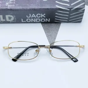Close-up of business memory titanium eyeglasses frame, elegant gold metal rim with black temples.