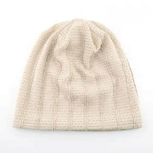 Detail view of a Japanese style mesh slouchy beanie, lightweight breathable knit cap for women.