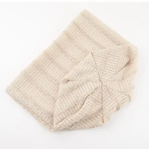 Beige mesh slouchy knit cap detail, breathable spring summer beanie hat texture display