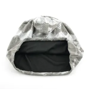 Distressed washed beanie detail showing soft fabric texture and black inner lining style.