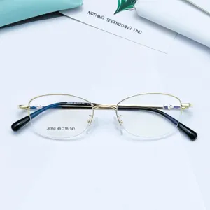 Montatura per occhiali semicerchiata dorata, elegante montatura ovale in metallo donna.