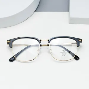 Stylish semi-rimless anti-blue light glasses featuring a sleek black and gold metal frame.