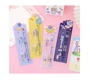 Astronaut stationery set detail view, featuring pencils, ruler, eraser and sharpener for kids.