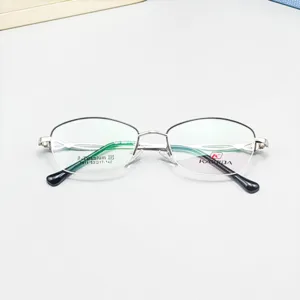 Classic semi-rimless oval metal eyeglass frame, lightweight business style, detailed view.