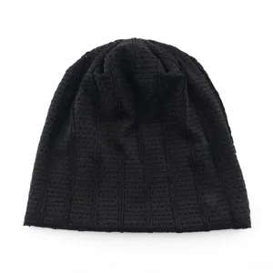 Black mesh slouchy beanie detail shot, breathable knit texture for spring and summer fashion wear.