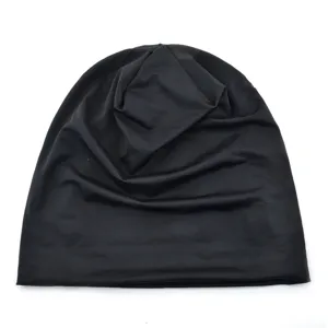 Black mesh breathable summer beanie detail, lightweight quick dry sports headwear close up.