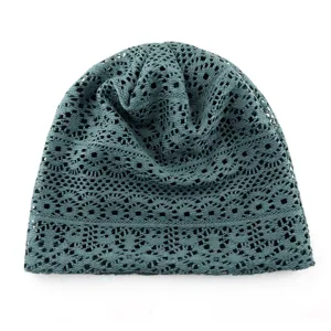 Detailed view of the breathable hollow crochet beanie hat, soft knit texture for summer.