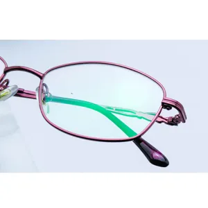 Detailed shot of trendy purple metal full rim eyeglasses frame for women business wear.
