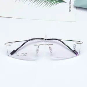 Lightweight rimless titanium prescription eyeglasses frame for men and women minimalist style.