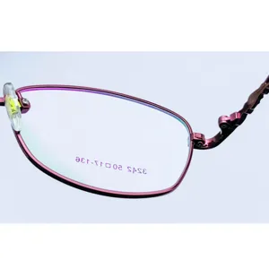 Close-up detail of purple metal eyeglasses frame showing hinge and rim design, professional shot.
