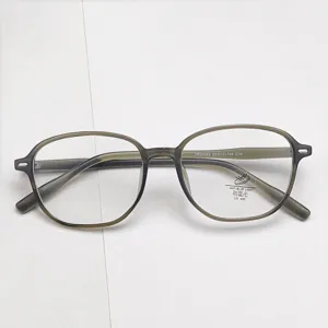 Detailed shot of retro TR optical glasses frame, vintage oval anti blue light eyewear for daily wear.