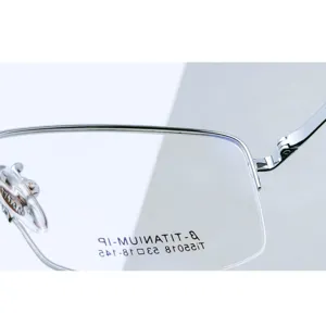 Men's pure titanium semi rimless eyeglasses frame detail view, business style metal optics.