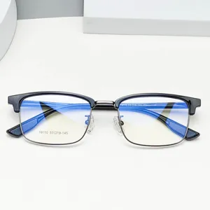 Close-up detail of men's TR90 browline glasses frame with anti-blue light lenses and clear specs.