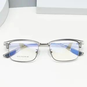 Detailed close-up shot of half-frame clear glasses with size text printed on anti-blue lens.