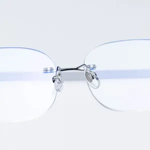 Monture de lunettes optique en titane sans rebord pour hommes femmes design minimaliste chic.