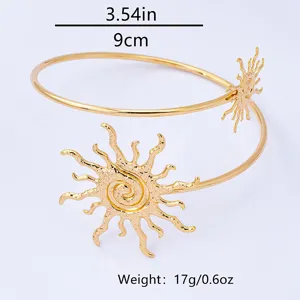 Gouden open bovenarm armband manchet met zonnebloem motief chic dames sieraden access