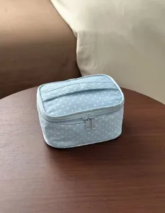 Lindo neceser de maquillaje azul con lunares y asa, bolsa de almacenamiento portátil de viaje.