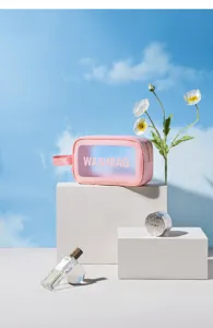 Pink transparent cosmetic bag portable toiletry bag with letter print for travel and daily use.