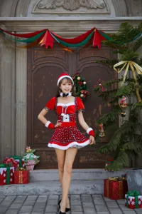 Detailed close-up view of the women's Christmas cosplay costume featuring polka dots.