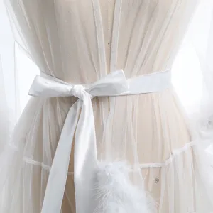 White sheer mesh long nightgown detail, elegant satin bow belt and fluffy feather trim decor.