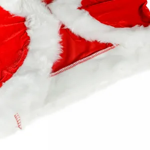 Détail de costume de Noël velours rouge bordure fausse fourrure blanche texture tissu